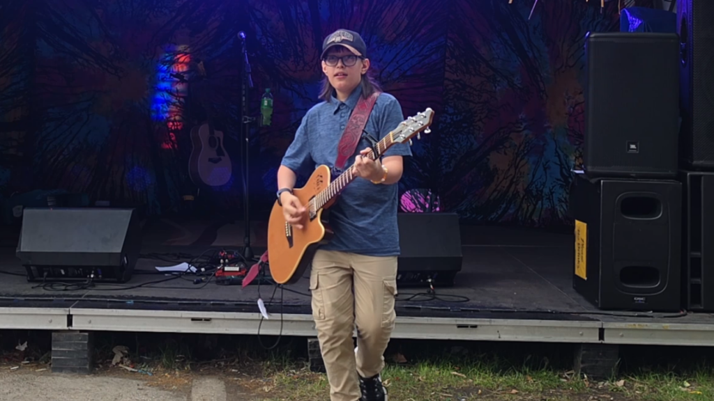 Holden Garcia performing on the Tiki Hut Stage at Summerfest.