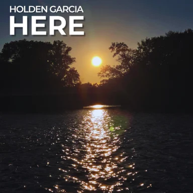 Here by Holden Garcia, cover artwork showing sunlight reflected on water between silhouetted trees.